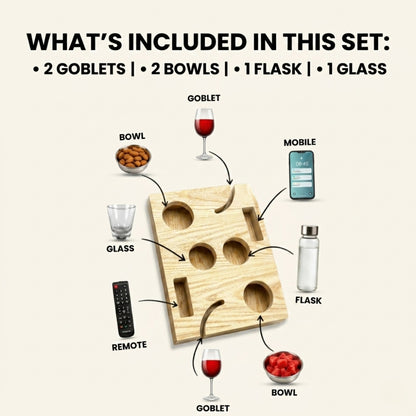 Wooden tray with compartments for various items including goblets, bowls, a flask, and a glass.